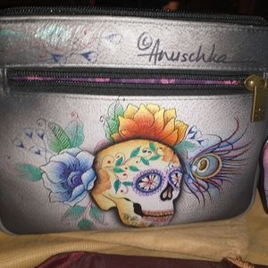 Anushka sugar skull ginuene leather clutch